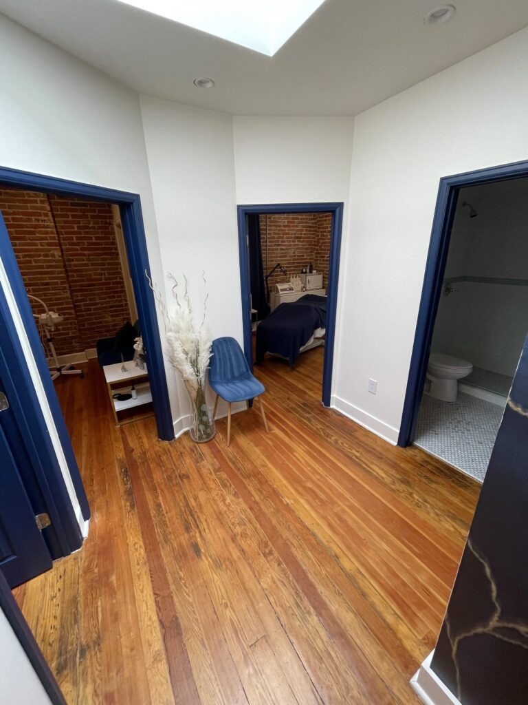 The landing between the Denver treatment rooms, navy door frames
