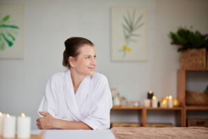 A client in a robe in the consultation room